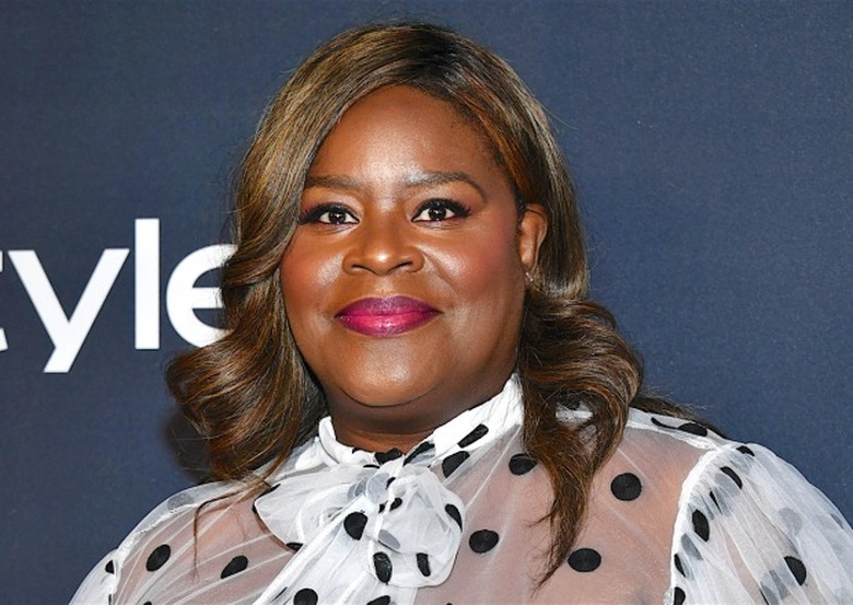 Retta Murder By the Book