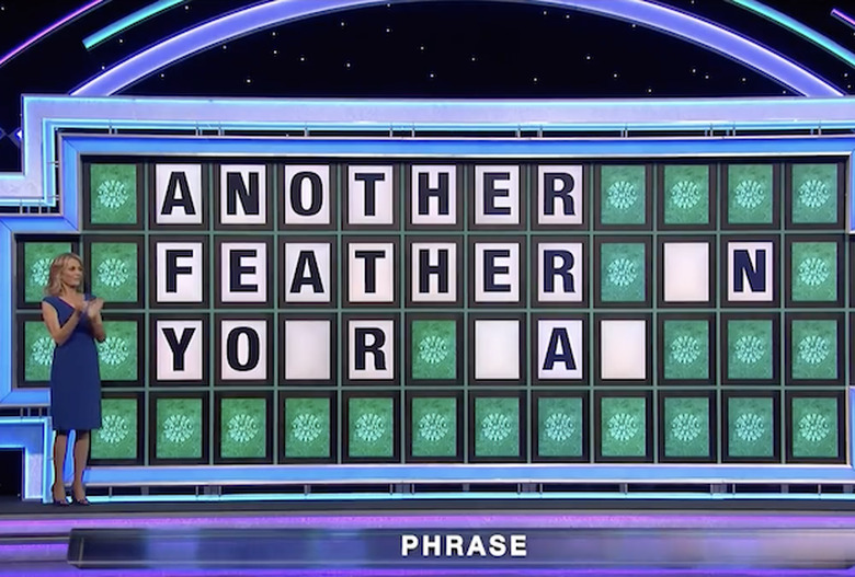 Wheel Fortune Feather Cap