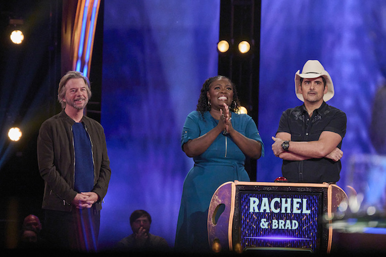 SNAKE OIL: L-R: Host David Spade, Contestant Rachel and Celebrity Advisor Brad Paisley 